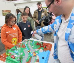 Students watching as a demonstration is given using Enviroscape.