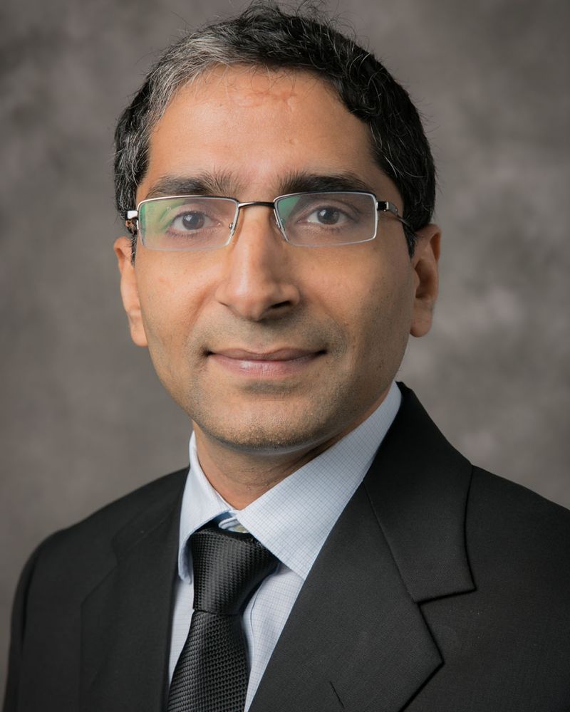 Portrait photograph of Dr. Mukesh Kumar