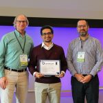 Savalan Naser Neisary, center, holds his Student Developer Award certificate while standing with Steve Burian, left, and Sagy Cohen, right, at the 2025 CIROH Developers Conference.