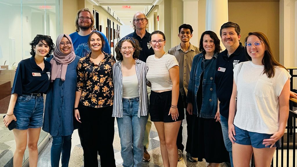 UA Water-R20 NRT graduates hold certificates during their program completion ceremony celebrating a year of interdisciplinary water science training.