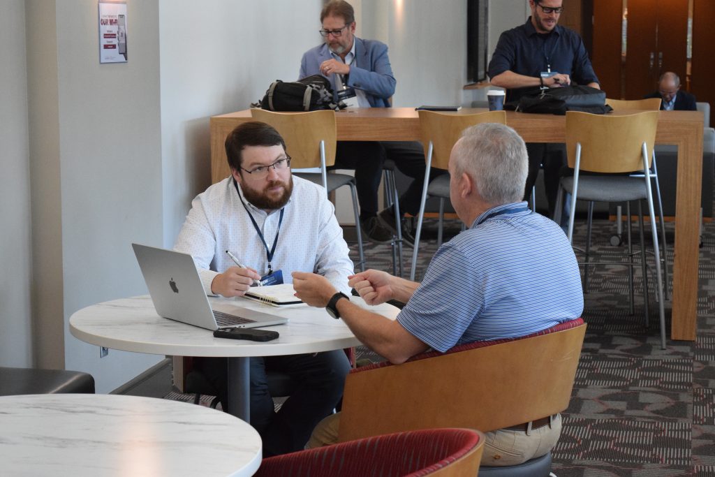 Researchers and professionals share ideas and insights during breakout discussions.