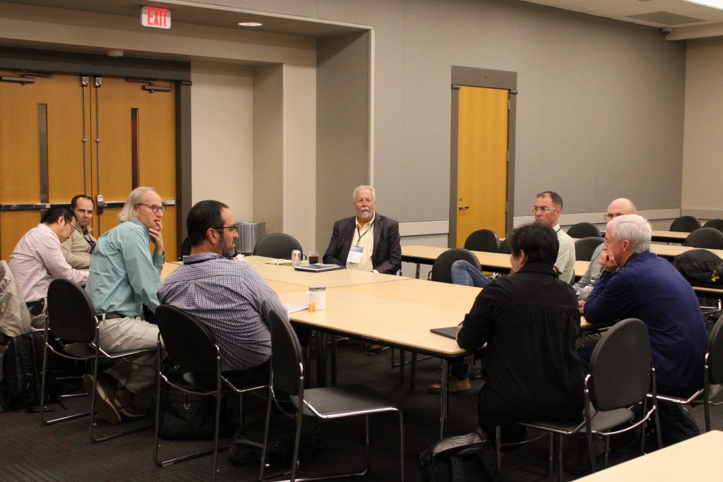 Researchers and professionals share ideas and insights during breakout discussions.