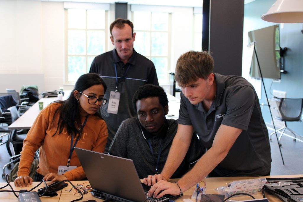 UA FLOW Academy students working with specific equipment - Arduino, Raspberry Pi, or sensors in USGS HIF lab.